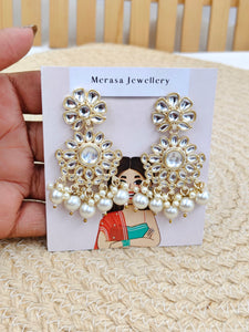 white ethnic earrings 