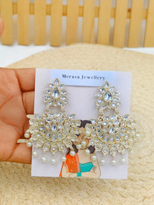 white earrings